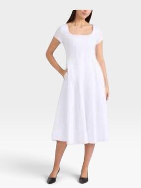 Corset waist dress
Poplin Cap Sleeve Paneled  white NEW lined Small MIDI length